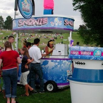 More folks in line for Snowie with a flavor station in the foreground.