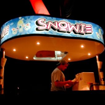 A Snowie Worker at his Booth!